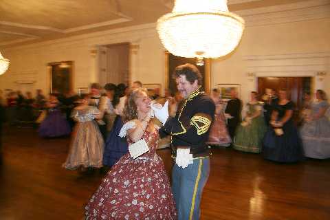 The sergeant and his lady waltz into the evening.